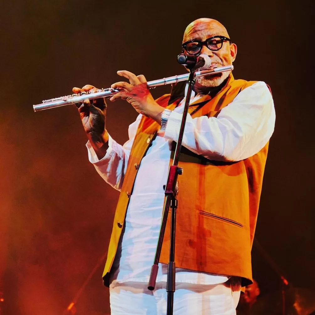 Sipho 'Hotstix' Mabuse playing flute